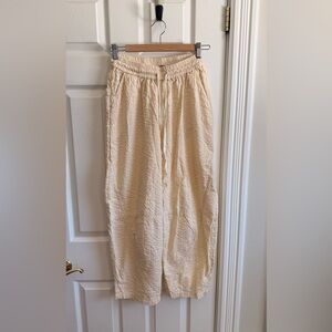Pale yellow barrel leg pants